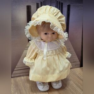 Adorable Cream Doll with Bonnet
